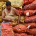 Fresh potatoes on display at a wholesale market in West Bengal, showcasing the vibrant agricultural trade in the region.